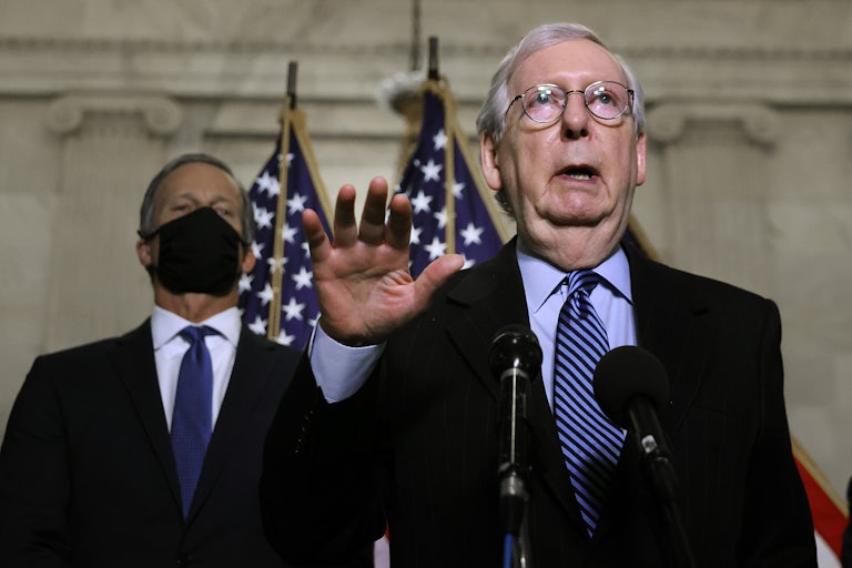 Mitch McConnell talks to reporters on Capitol Hill.