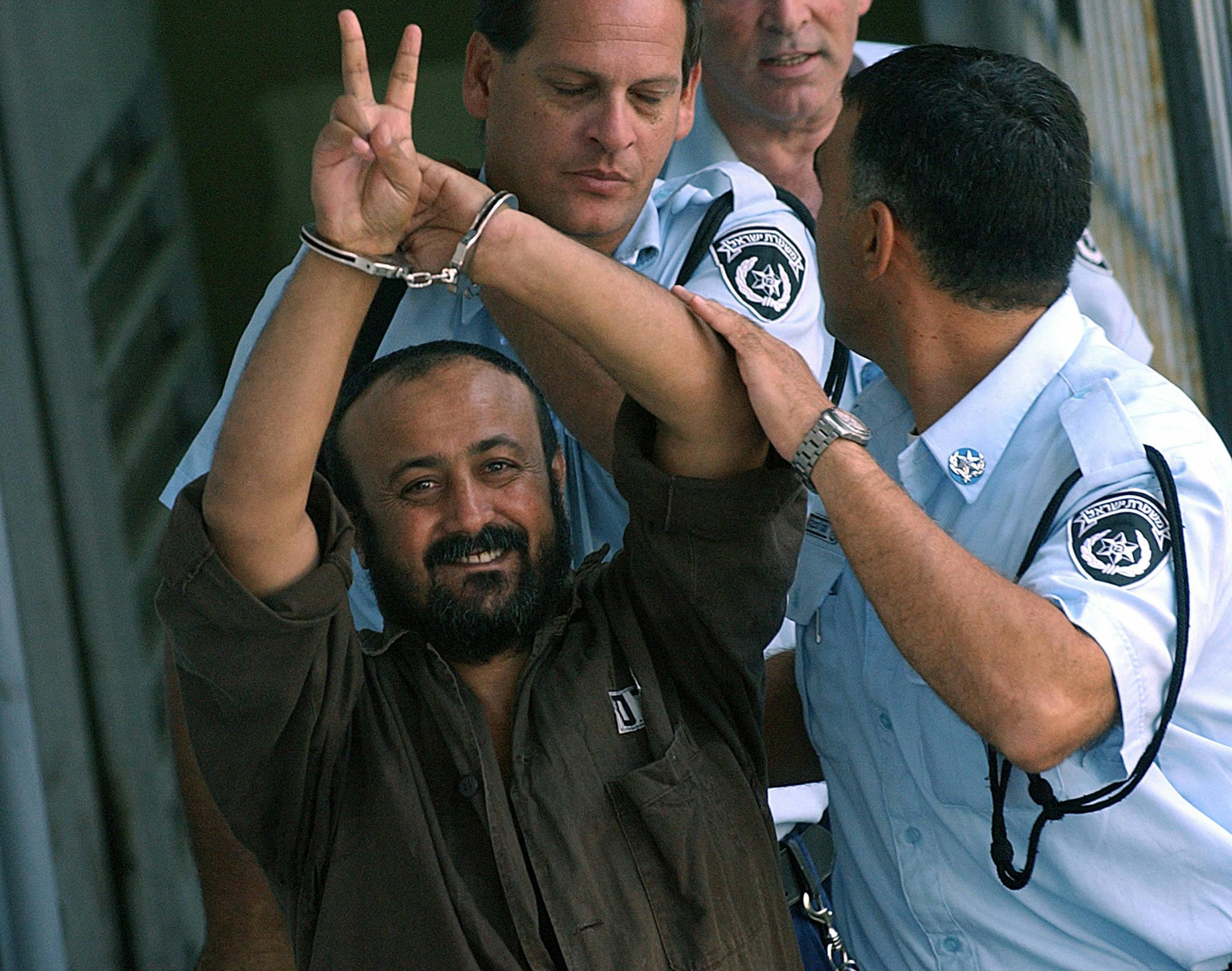 Marwan Barghuti in 2003, on his way back to jail after appearing before a Tel Aviv court