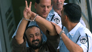 Marwan Barghuti in 2003, on his way back to jail after appearing before a Tel Aviv court