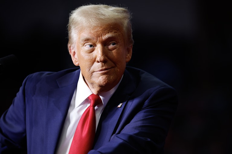 Donald Trump does a mischievous little smirk