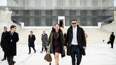 Rebecca Slaughter, former commissioner at the Federal Trade Commission, and her husband Justin Slaughter depart the U.S. Supreme Court in Washington, D.C. The court signaled it’s poised to give the president control over potentially dozens of traditionally independent federal agencies as the conservative wing cast doubt on a 90-year-old precedent.