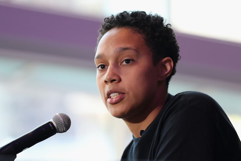Brittney Griner speaks into a microphone