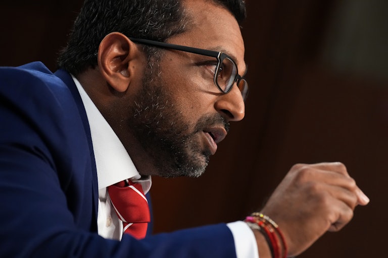 FBI Director Kash Patel gestures while testifying in a Senate committee hearing
