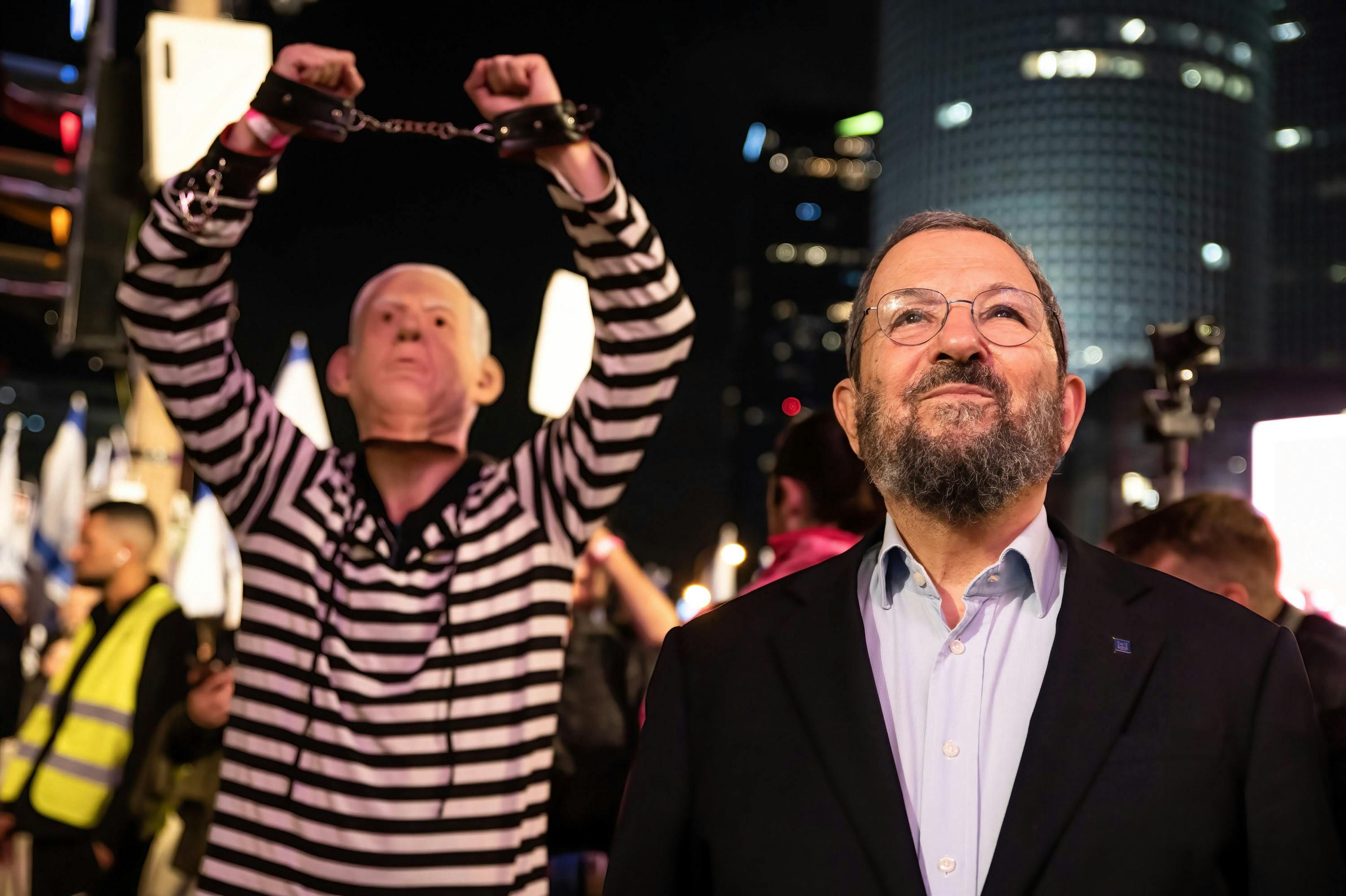 Ehud Barak, former prime minister of Israel, listens to a speech 