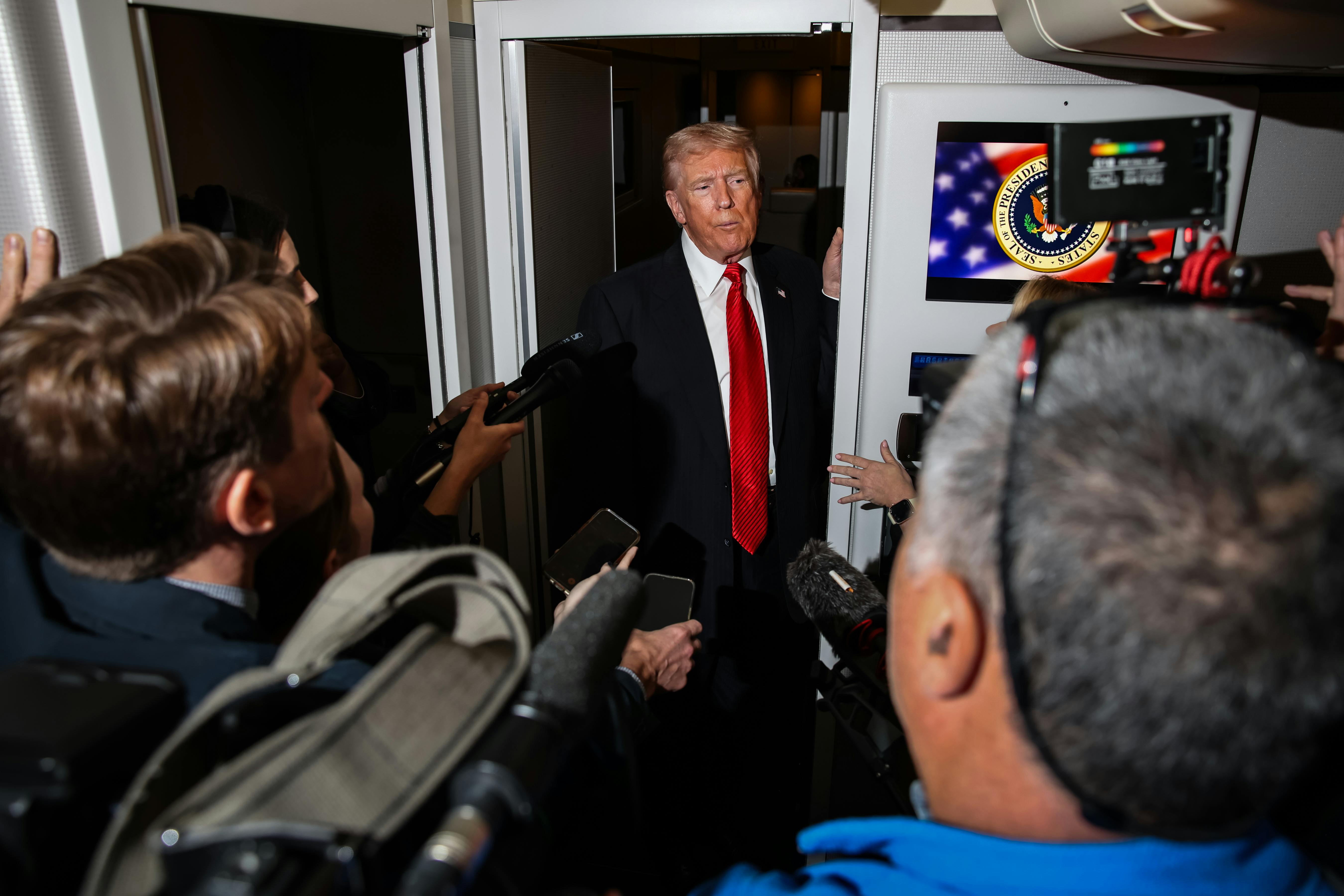 Trump speaking to reporters on Air Force One 
