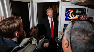 Trump speaking to reporters on Air Force One