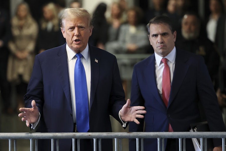 Donald Trump gestures as he speaks